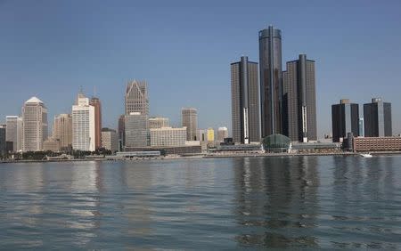 FILE PHOTO: The skyline of the city of Detroit, Michigan is seen along the Detroit river from Windsor, Ontario September 28, 2013.