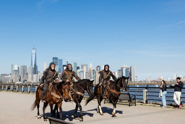 <p>Experiential Supply</p> Actors dressed as apes on horseback on April 26, 2024