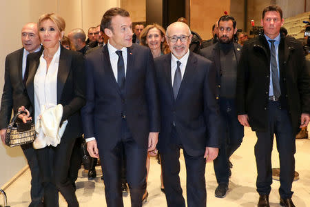 (From L) Minister of Interior Gerard Collomb, French President's wife Brigitte Macron, French President Emmanuel Macron, Justice Minister Nicole Belloubet, CRIF President Francis Kalifat and bodyguard Alexandre Benalla arrive at the Louvre Pyramid to attend the 33rd annual dinner of the Representative Council of Jewish Institutions of France (CRIF - Conseil Representatif des Institutions juives de France) in Paris, March 7, 2018. Ludovic Marin/Pool via REUTERS