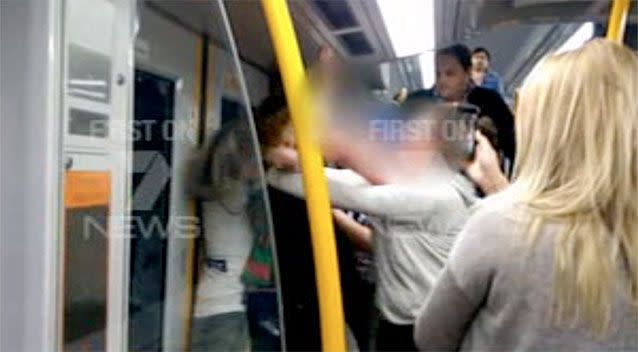 The violence was captured by a female commuter on the late night train. Photo: 7 News