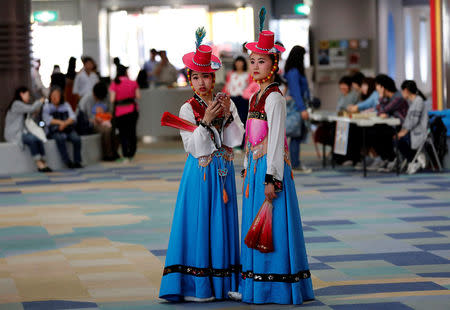 High school students from a dance club at Kanagawa Korean Middle and High School stand in the lobby after their traditional dance performance at a local international day event to promote a multicultural society in Yokohama, Kanagawa Prefecture, Japan, May 20, 2018. REUTERS/Kim Kyung-Hoon