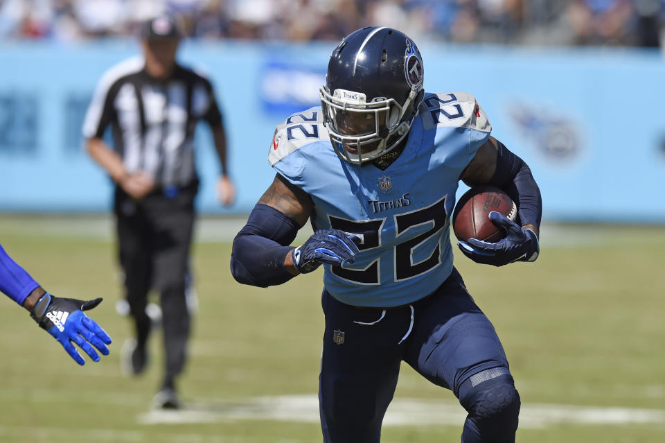 Tennessee Titans running back Derrick Henry (22) carries the ball against the Indianapolis Colts in the first half of an NFL football game Sunday, Sept. 26, 2021, in Nashville, Tenn. (AP Photo/Mark Zaleski)