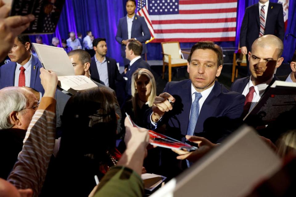 <div class="inline-image__caption"><p>Florida Governor Ron DeSantis greets attendees and signs books during his first trip to the early voting state of Iowa for a book tour stop at the Iowa State Fairgrounds in Des Moines, Iowa, March 10, 2023.</p></div> <div class="inline-image__credit">Jonathan Ernst/Reuters</div>