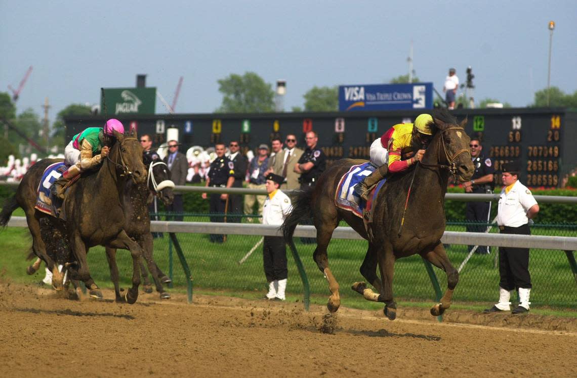 Fusaichi Pegasus, ridden by Kent Desormeaux, won the 126th Kentucky Derby by a length and a half over Aptitude in 2000. Jahi Chikwendiu/Herald-Leader File Photo