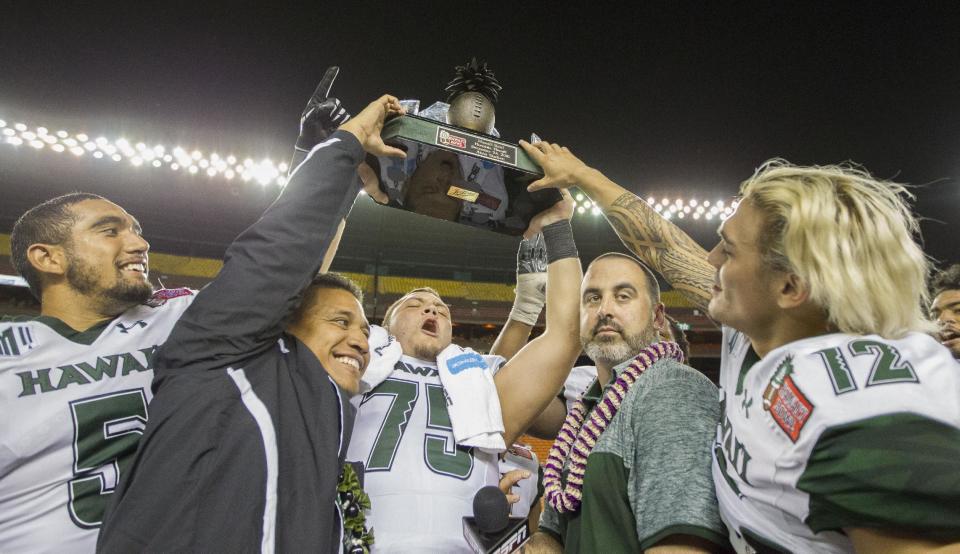 Nick Rolovich and Hawaii always come up with creative ways to give out scholarships. (AP)