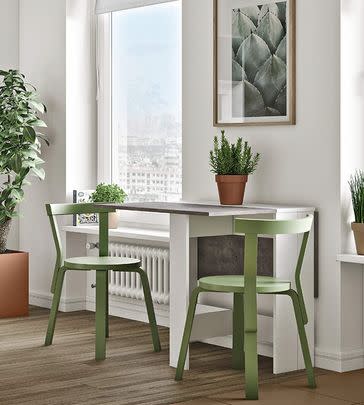 Use this foldable piece of furniture as a console, dining table, or desk