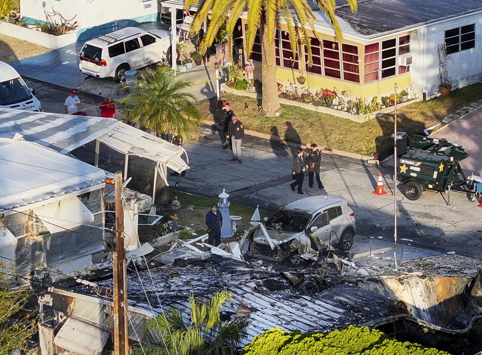 An aerial drone shows the scene of Thursdays plane crash in Clearwater, Fla., on Friday, Feb. 2, 2023. Authorities are trying to determine how many people died in the crash of a small plane into a Florida mobile home park. (Dirk Shadd/Tampa Bay Times via AP)