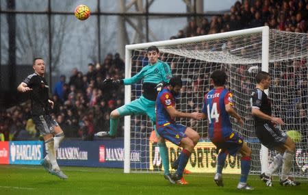 Football Soccer - Crystal Palace v Chelsea - Barclays Premier League - Selhurst Park - 3/1/16 Crystal Palace's Mile Jedinak in action with Chelsea's Thibaut Courtois Reuters / Dylan Martinez Livepic