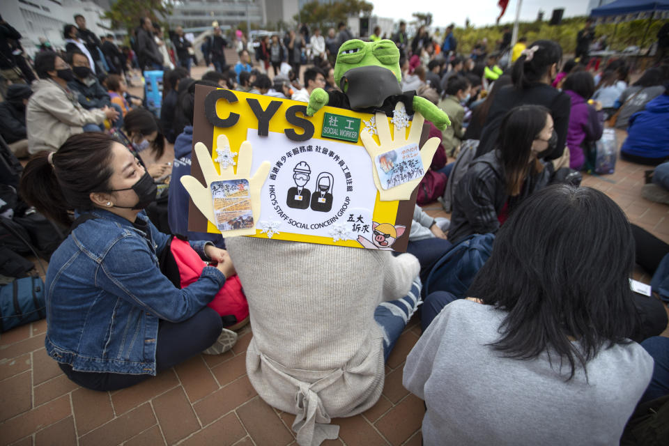 Protesters gather during a rally in Hong Kong, Sunday, Dec. 15, 2019. Hong Kong police said on Saturday that they have arrested three men for testing homemade explosives they suspect were intended for use during protests. (AP Photo/Mark Schiefelbein)