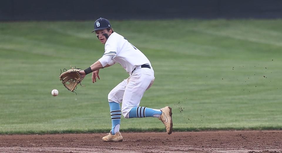 Cincinnati Country Day shortstop Davis Campbell  (7) fields the ball in their baseball game against CHCA Tuesday, April 12, 2022.