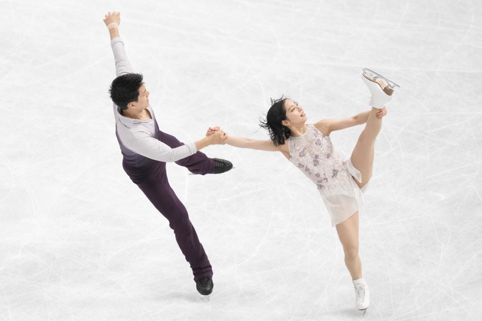 Riku Miura and Ryuichi Kihara of Japan perform during the pairs' free skating program in the World Figure Skating Championships in Saitama, north of Tokyo, Thursday, March 23, 2023. (AP Photo/Hiro Komae)