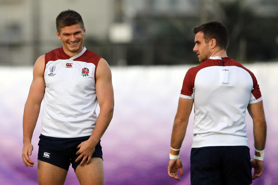 England's Owen Farrell, left, and George Ford attend a training session in Urayasu, outside Tokyo, Japan, Wednesday, Oct. 23, 2019. England will play New Zealand in a Rugby World Cup semifinal in Yokohama on Saturday Oct. 26. (AP Photo/Christophe Ena)