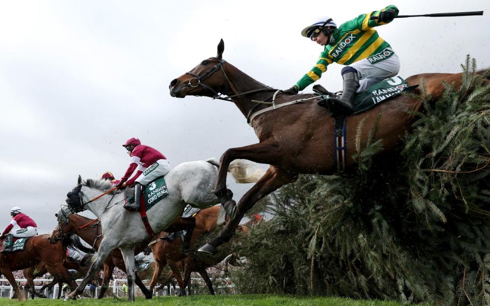 Paul Townend riding I Am Maximus jumps the Chair en route to victory in the Grand National