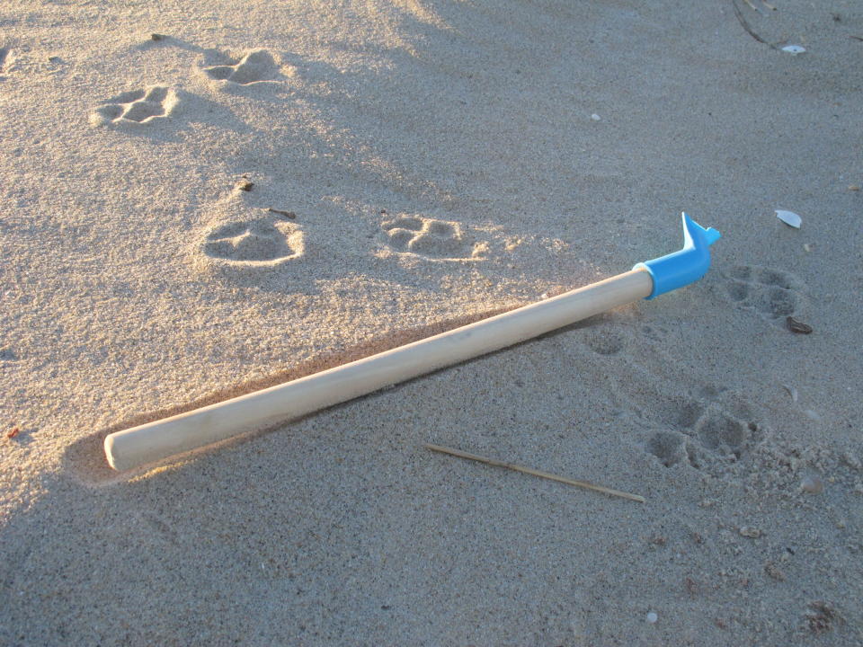 This Feb. 6, 2022, photo shows a broken beach shovel on the sand in Sandy Hook, N.J. On March 30, 2022, the Clean Ocean Action environmental group said over 10,000 volunteers picked up over 513,000 pieces of trash from New Jersey's beaches last year, setting a new record. (AP Photo/Wayne Parry)