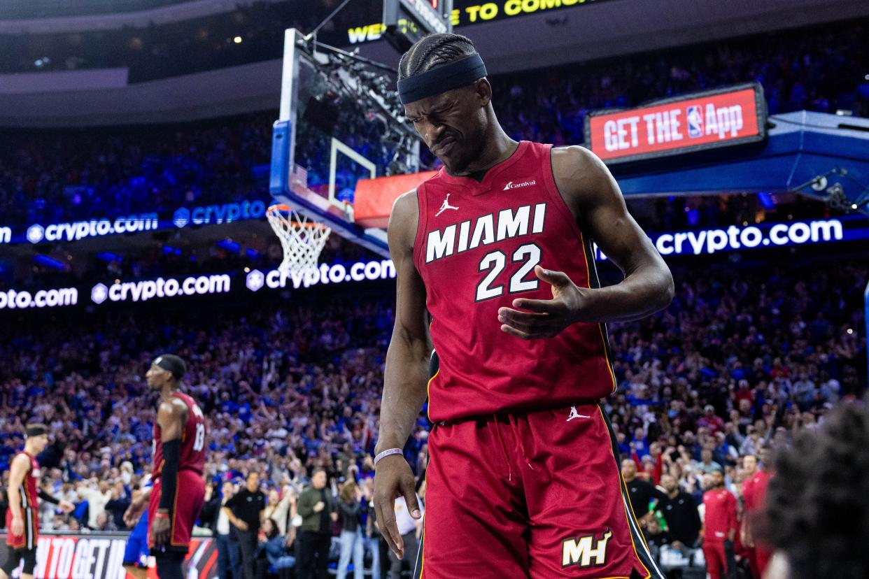 Jimmy Butler grimaces after being fouled in the fourth quarter of the Heat's play-in tournament game against the 76ers on Wednesday night.