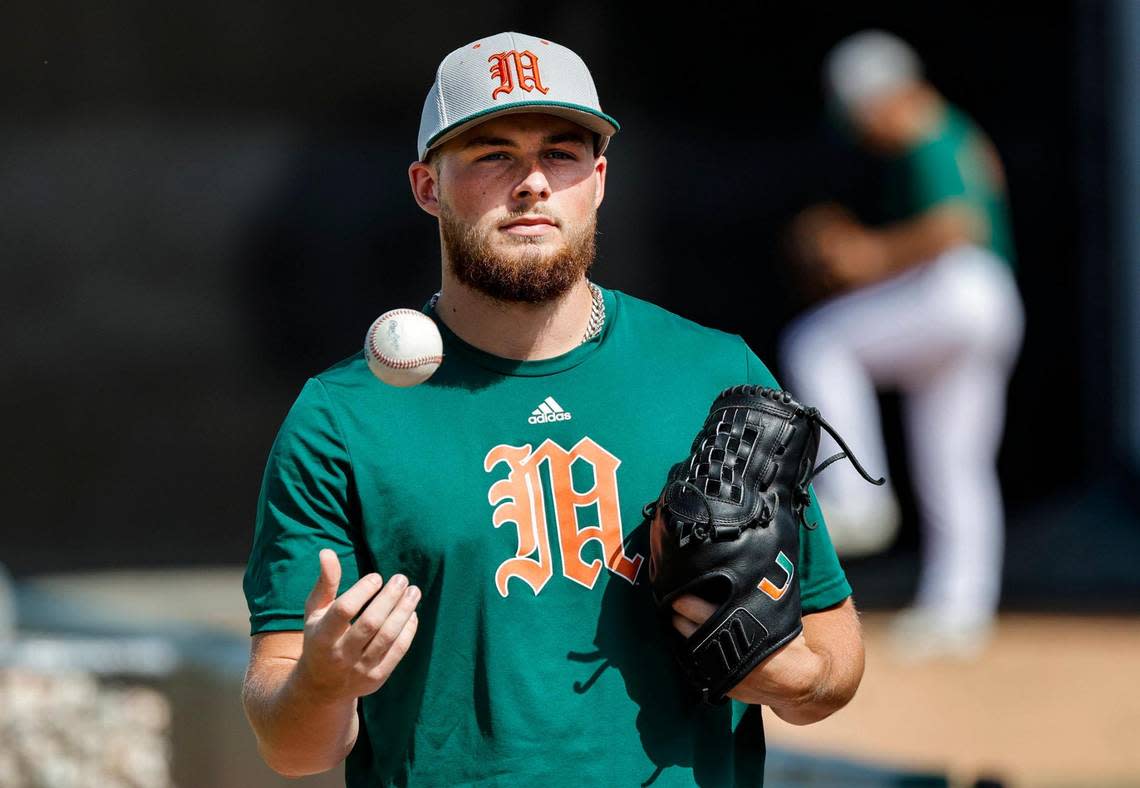 Miami Hurricanes pitcher Gage Ziehl (31) tosses the ball during practice at Miami Hurricanes Media Day at Alex Rodriguez Park at Mark Light Field in Coral Gables, Florida on Tuesday, February 13, 2024. Al Diaz/adiaz@miamiherald.com