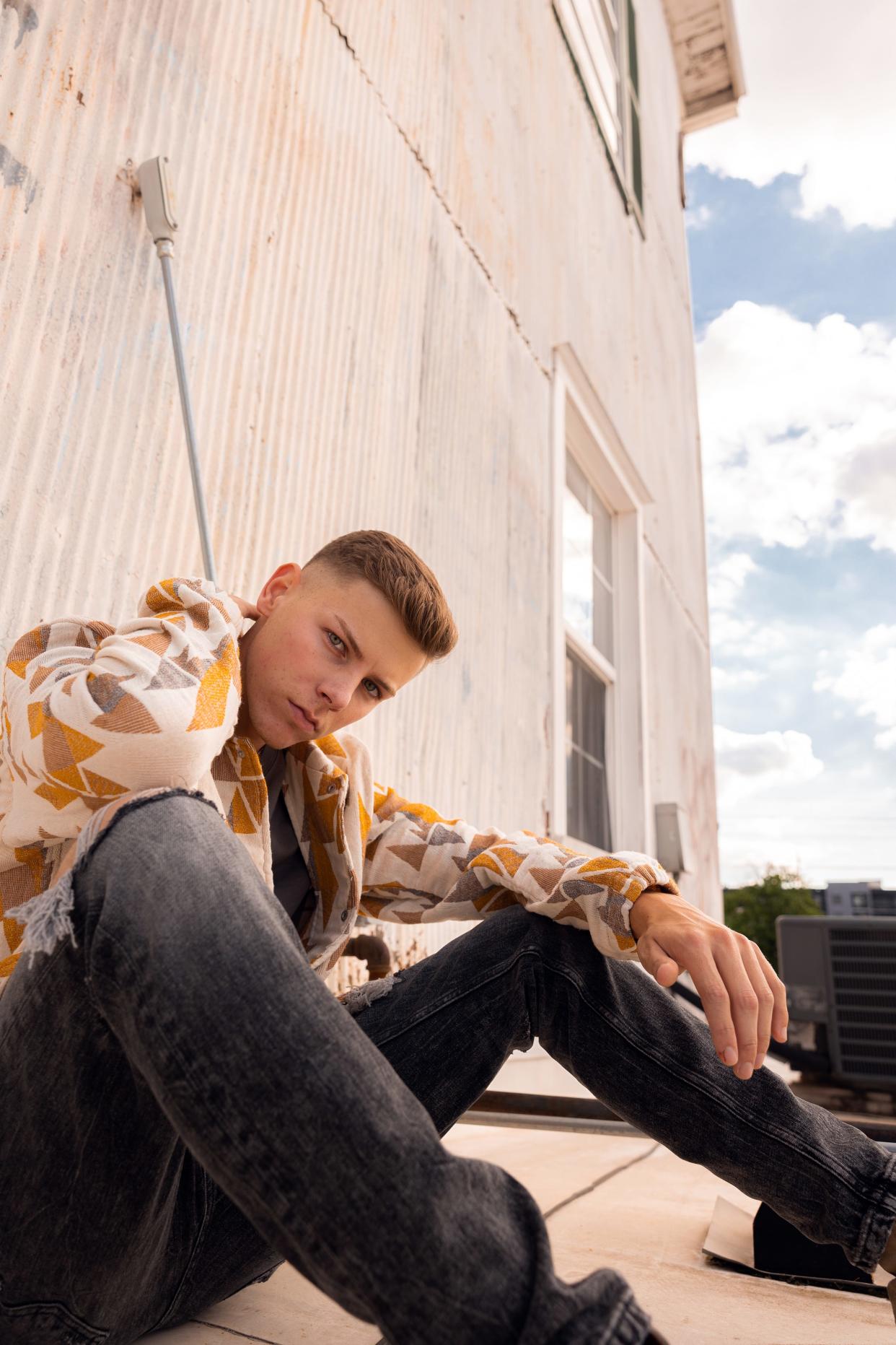 Cherokee pop-soul singer Austin Markham was among the recording artists who contributed a song to the new Cherokee-language album "Anvdvnelisgi," which translates to "Performers" in English.