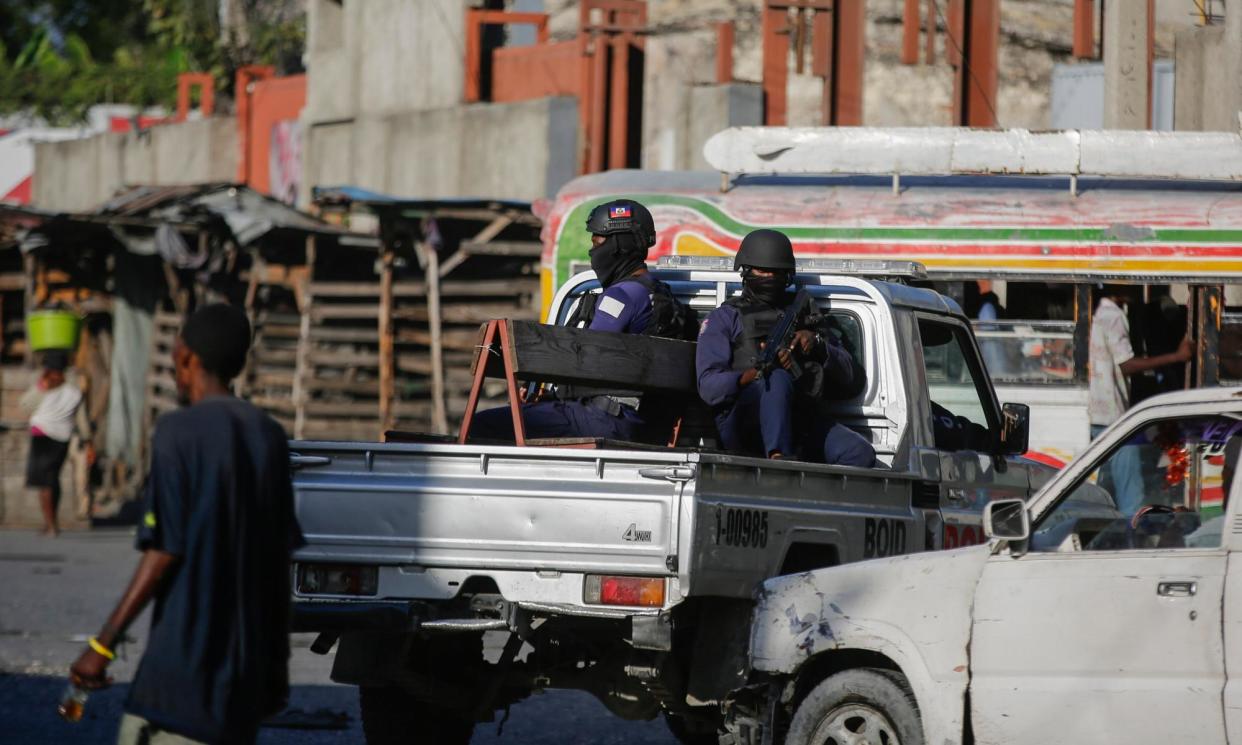 <span>Photograph: Odelyn Joseph/AP</span>