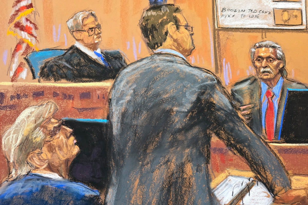 Former US President Donald Trump watches as prosecutor Joshua Steinglass questions David Pecker before Justice Juan Merchan on 23 April (REUTERS)