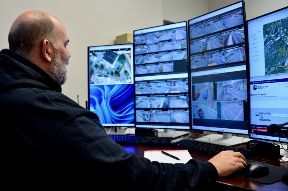 Ben Ros, supervisor at Hagerstown Police Department's Watch Center, scans live footage from 36 of the surveillance cameras along city streets on March 5, 2024. Ros, who speaks Spanish, also can translate for patrol officers, speaking to them through their bodycams.