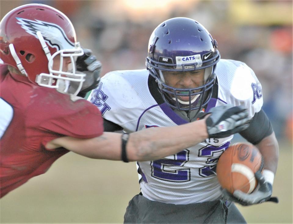 ACU receiver Jerale Badon fends off a defender after making a catch. He played four seasons (2004-07) for the Wildcats after graduating from Abilene High.