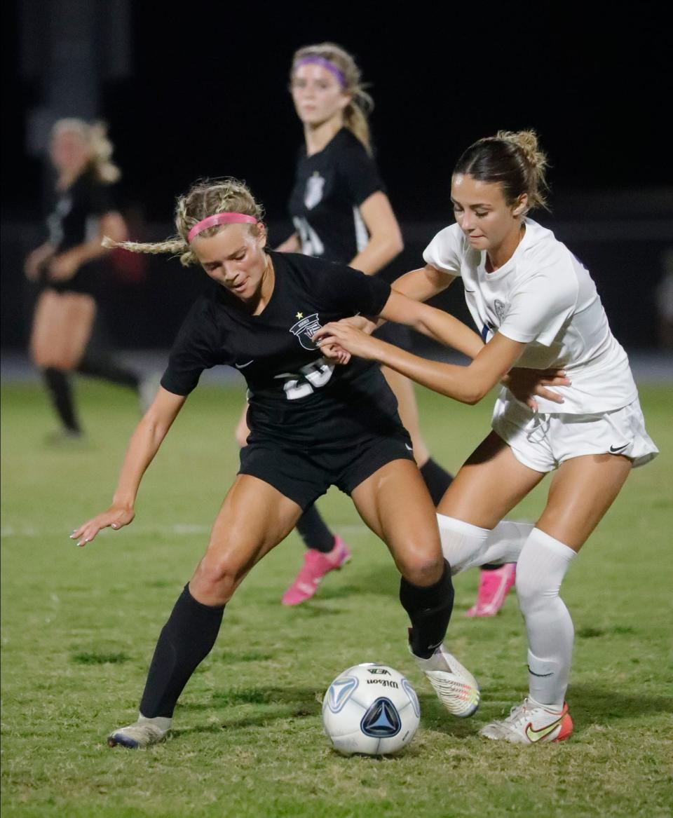 Naples' Ava Majury faces off against Mariner's Ryleigh Acosta in the Class 5A-Region 3 semifinal game played on Friday, Feb. 10, 2023.