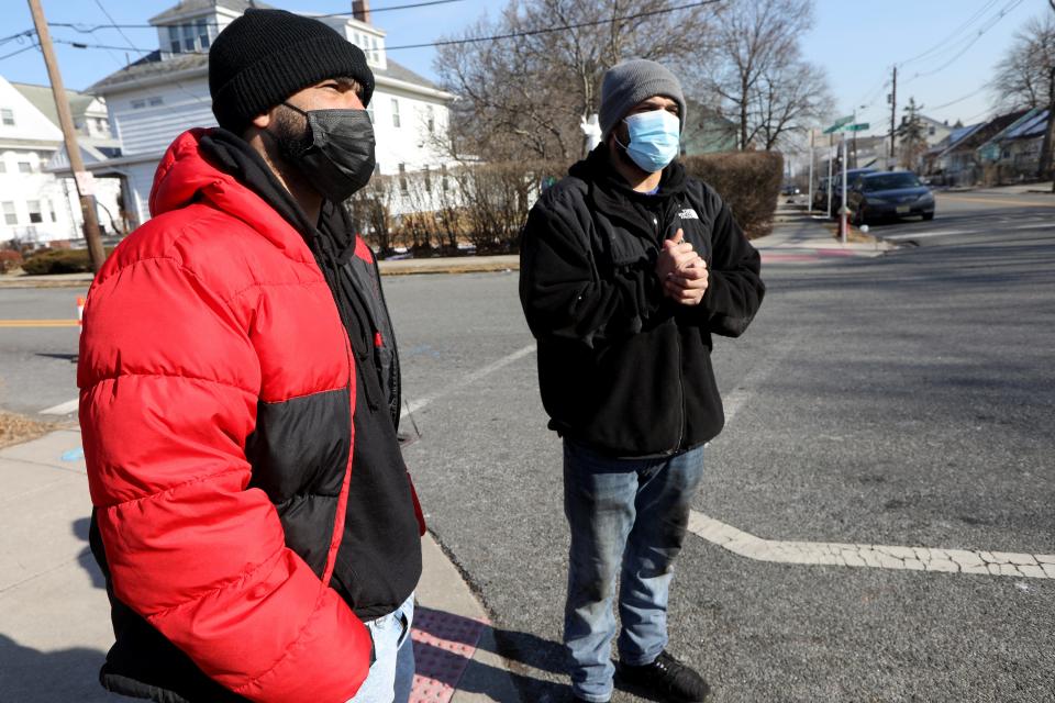 Giovanni De Jesus (red) and Eric De Jesus speak to the media at the intersection of Preakness Ave. and Front St. The Paterson intersection was the last location their brother, Felix Joel De Jesus was seen.  Members of the Paterson Police Department were the last known people to see Felix on February 2. Wednesday, February 16, 2022