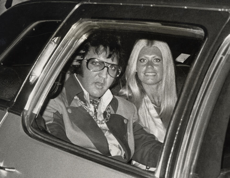 Elvis in a car