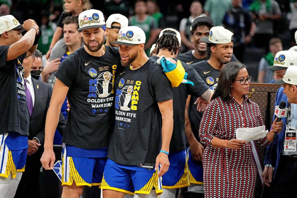 Stephen Curry and Klay Thompson celebrate their fourth NBA championship as teammates.