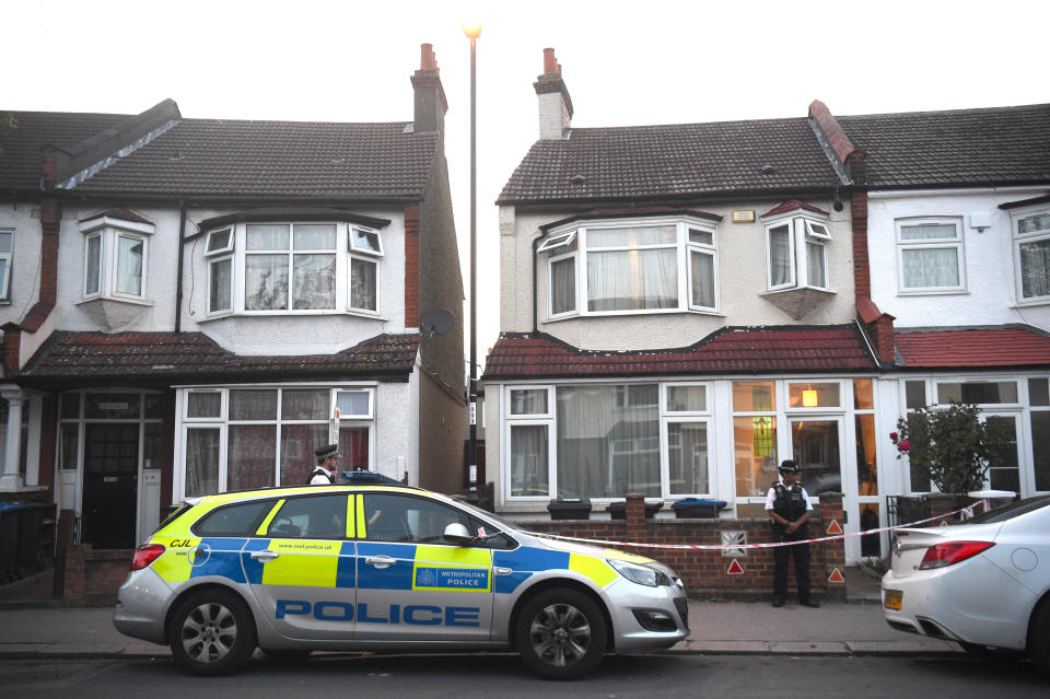 Police at the scene in Raymead Avenue, Thornton Heath, Croydon where a woman who was about eight months' pregnant has been stabbed to death and her baby is critically ill in hospital.