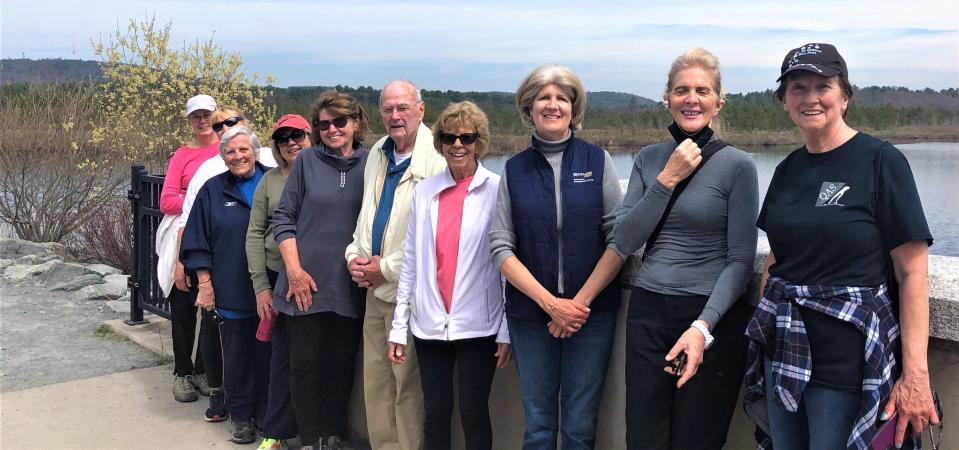 The Milton Senior Center walking club finishes a 4-mile hike around Ponkapoag Pond in Canton. From left, Denise Rochlin, Terri McGuane, Loraine Sumner, Donna Hiamietro, Kathy Tighe, Paul Lydon, Betty Jean Regan, Nancy Chisholm, Susan Coffey and Patricia Lynch.