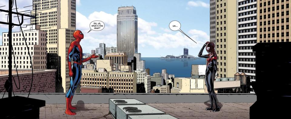 A still from Spider-Men shows Miles and Peter talking on a roof in their respective Spider costumes