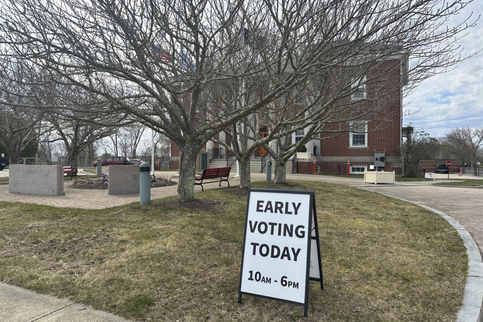 A sign reminding voters they can cast their votes early in the April 2 presidential primary in Connecticut was placed outside the Stonington Town Hall in Stonington, Conn., on Wednesday, March 27, 2024. The four-day early voting period marks the first time voters can cast their votes early and in-person in Connecticut. (AP Photo/Susan Haigh)