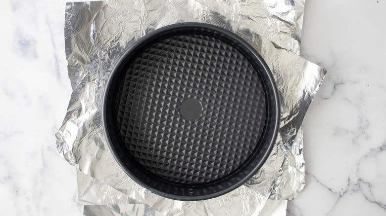 springform pan with aluminum foil