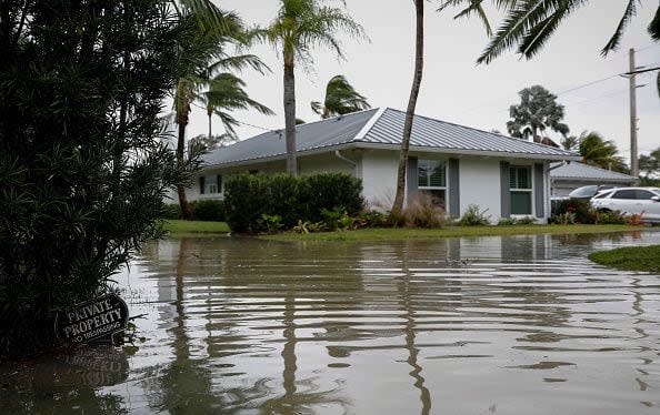 A Private Property, No trespassing on a flooded street after Hurricane Nicole landfall, in Vero Beach, Florida, on November 10, 2022. - Tropical Storm Nicole slowed after making landfall in the US state of Florida, meteorologists said Thursday. (Photo by Eva Marie UZCATEGUI / AFP) (Photo by EVA MARIE UZCATEGUI/AFP via Getty Images)