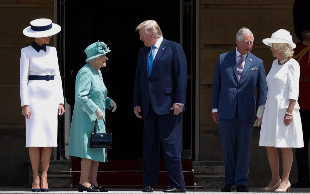 The US president is eager to observe protocol during his royal engagements  - AFP