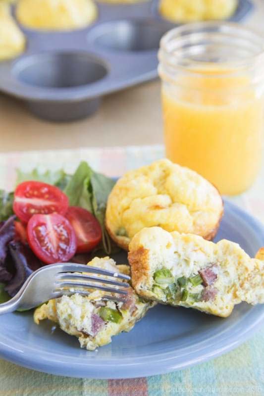 <p>Cupcakes & Kale Chips</p><p>The classic savory flavors of spring make these mini quiches absolutely delightful.</p><p><strong>Get the recipe: <a href="https://cupcakesandkalechips.com/ham-asparagus-goat-cheese-egg-muffin-cups/" rel="nofollow noopener" target="_blank" data-ylk="slk:Ham Asparagus and Goat Cheese Egg Muffin Cups;elm:context_link;itc:0;sec:content-canvas" class="link ">Ham Asparagus and Goat Cheese Egg Muffin Cups</a></strong></p>