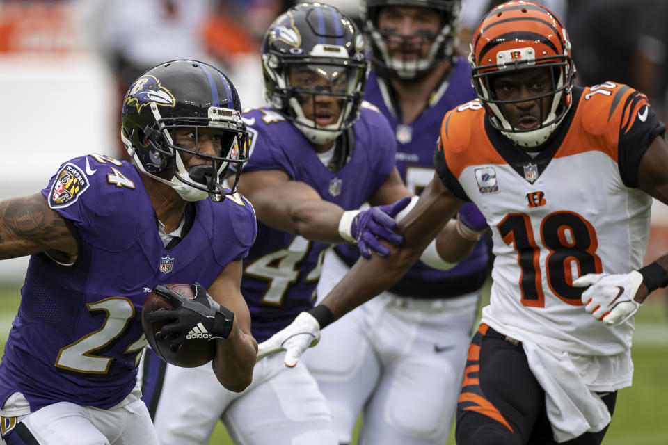 BALTIMORE, MD - OCTOBER 11: Marcus Peters #24 of the BaltimaA.J. Green was not interested in making a tackle on this play. (Photo by Scott Taetsch/Getty Images)ore Ravens returns an interception as A.J. Green #18 of the Cincinnati Bengals pursues during the first half at M&T Bank Stadium on October 11, 2020 in Baltimore, Maryland. (Photo by Scott Taetsch/Getty Images)