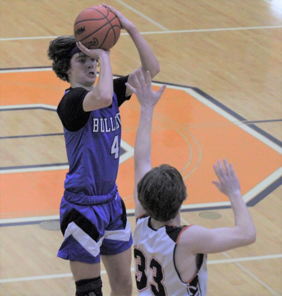 Senior guard Kaden Hansel (4) scored a game-high 35 points for Inland Lakes at Gaylord St. Mary on Friday night, but the Bulldogs were edged by the Snowbirds in overtime.