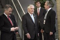 US Secretary of State Rex Tillerson, center, arrives for the opening session meeting of the G20 foreign ministers at the World Conference Center in Bonn, Germany, Thursday, Feb. 16, 2017. Foreign ministers from 20 of the world’s leading nations met Thursday in the former German capital to discuss current conflicts and ways to prevent future crises against a backdrop of uncertainty among allies and adversaries about the direction of U.S. foreign policy. (AP Photo/ Brendan Smialowski, Pool)