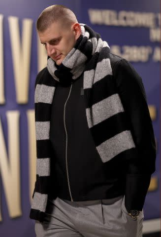 <p>Matthew Stockman/Getty</p> Nikola Jokic dresses up as Gru ahead of an April 20 game at Denver's Ball Arena