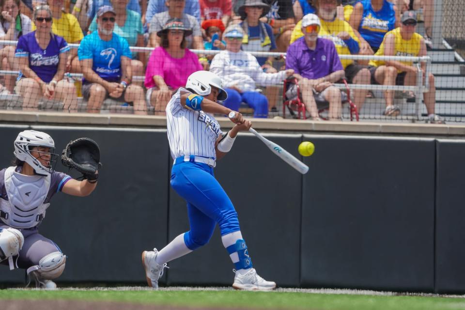 Life as a pro softball player is much different than in college.