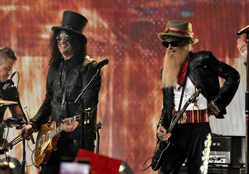 Slash, left, and Billy Gibbons perform during a Lynyrd Skynyrd tribute at the CMT Music Awards on Sunday, April 2, 2023, at the Moody Center in Austin, Texas. (Photo by Evan Agostini/Invision/AP)