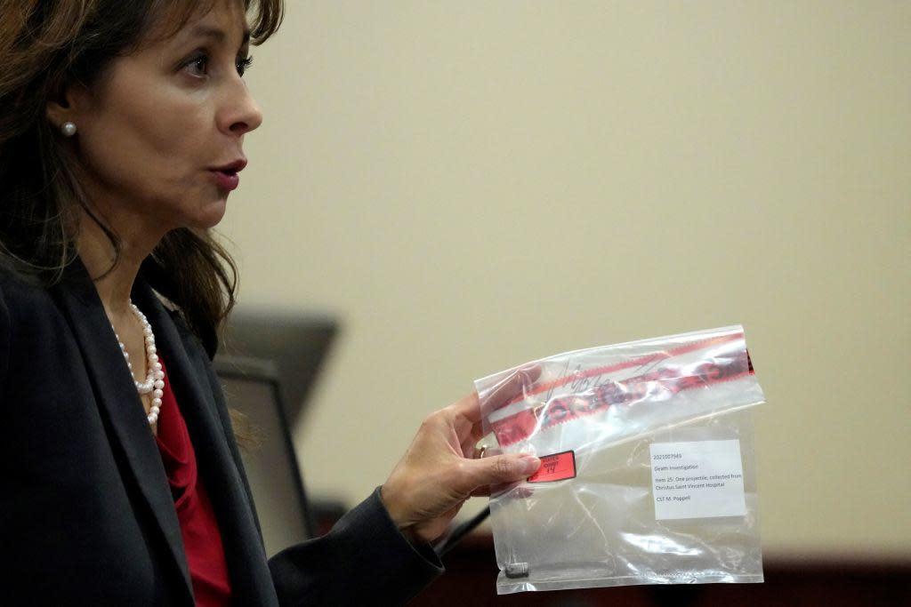 Special prosecutor Erlinda Ocampo Johnson shows a bullet in an evidence bag during actor Alec Baldwin's involuntary manslaughter trial in Santa Fe County District Court on July 10, 2024 in Santa Fe, New Mexico.  / Credit: ROSS D. FRANKLIN/POOL/AFP via Getty Images