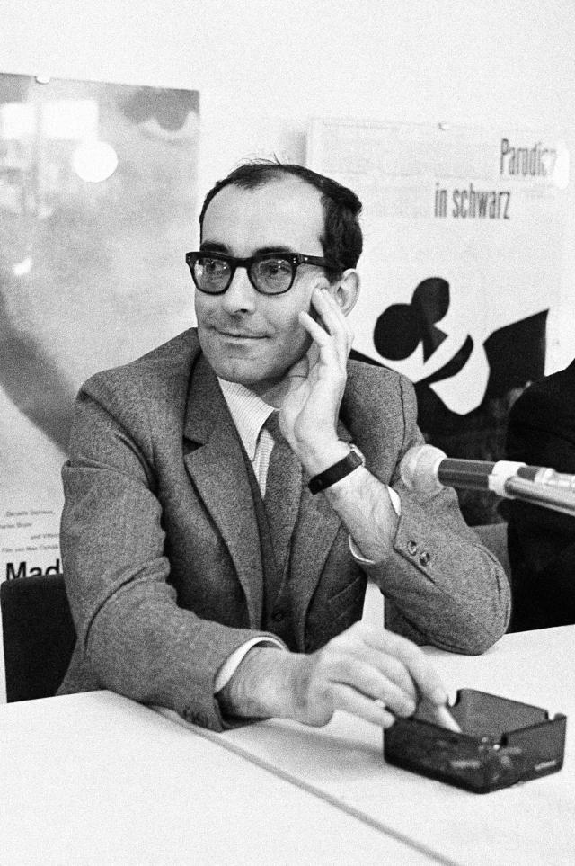 FILE - Jean-Luc Godard's "Masculin, feminin" is being tipped in the 16th annual Berlin Film Festival as an insider for the top movie prize, the Berlin Golden Bear. Here, Godard is seen during a press conference in Berlin, June 27, 1966. Director Jean-Luc Godard, an icon of French New Wave film who revolutionized popular 1960s cinema, has died, according to French media. He was 91. Born into a wealthy French-Swiss family on Dec. 3, 1930, in Paris, the ingenious "enfant terrible" stood for years as one of the world's most vital and provocative directors in Europe and beyond — beginning in 1960 with his debut feature "Breathless." (AP Photo/Edwin Reichert, File)