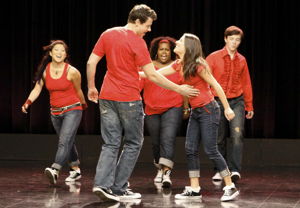 teens singing on stage