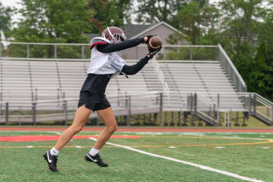 South River's Joseph Lepore catches a pass at the Marisa Rose Bowl practice at Woodbridge High School on June 23, 2023.