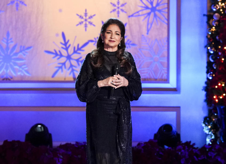 This image released by CBS shows Gloria Estefan hosting “The 24th Annual A Home for the Holidays at the Grove," airing Friday, Dec. 23 on CBS, and Paramount+. (Sonja Flemming/CBS via AP)