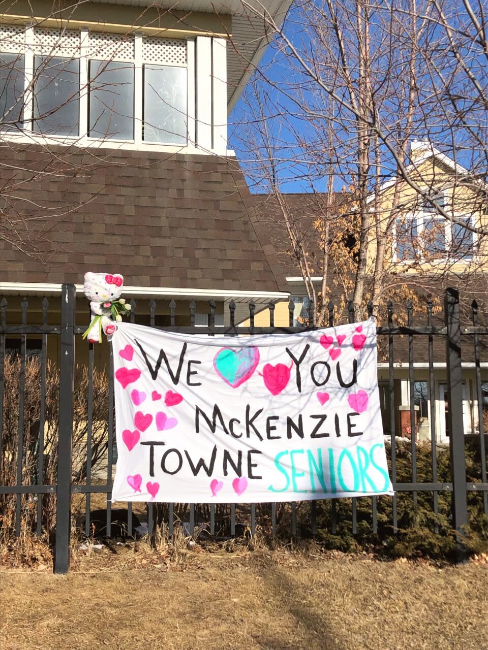 This sign was posted on the fence outside the McKenzie Towne Continuing Care Centre in southeast Calgary as a COVID-19 outbreak swept through the facility in the spring of 2020 