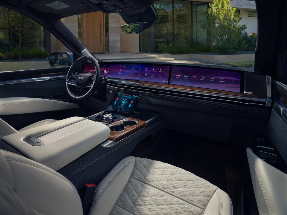 An interior view of the 2025 Cadillac Escalade with a 55-inch touchscreen.